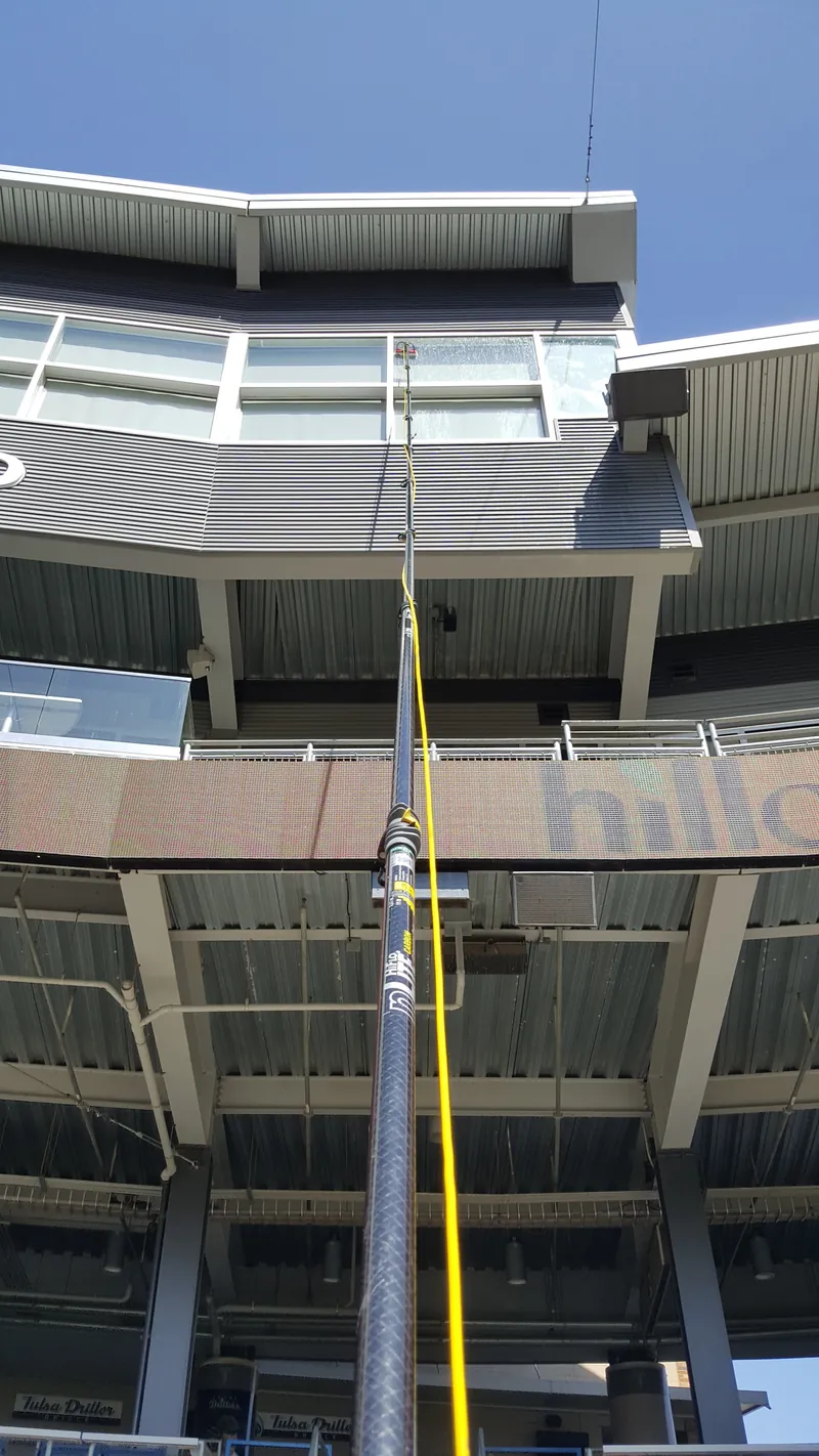 A water-fed pole reaching the upper-deck glass at ONEOK Field, home of the Tulsa Drillers.